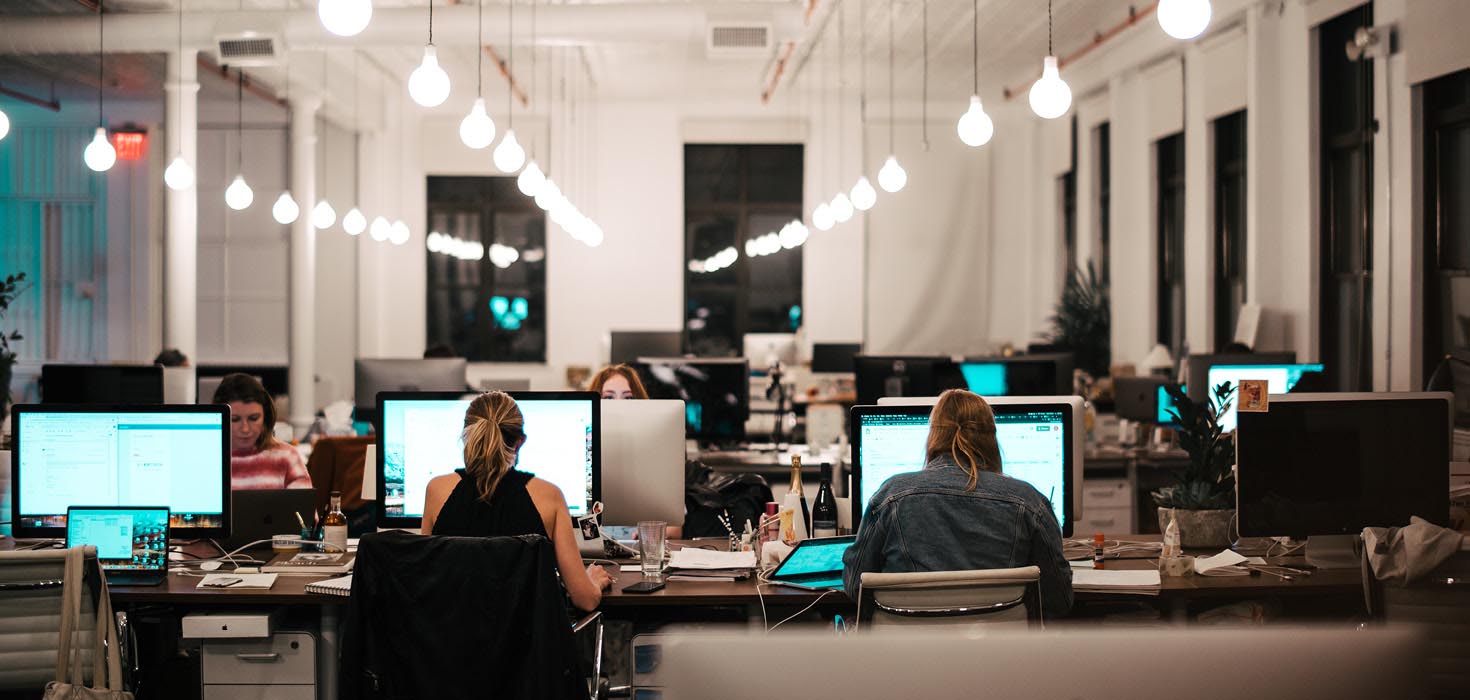 people working in an office.