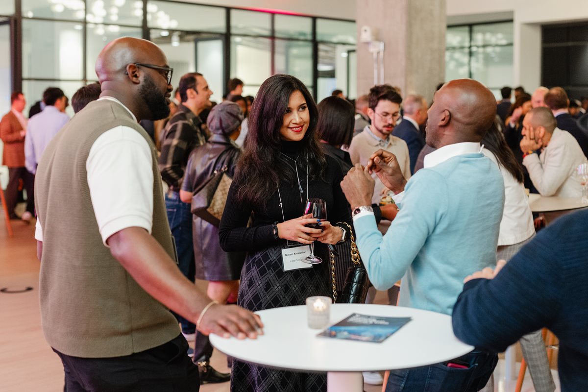 People networking at a past TRBOT event at the Quay.