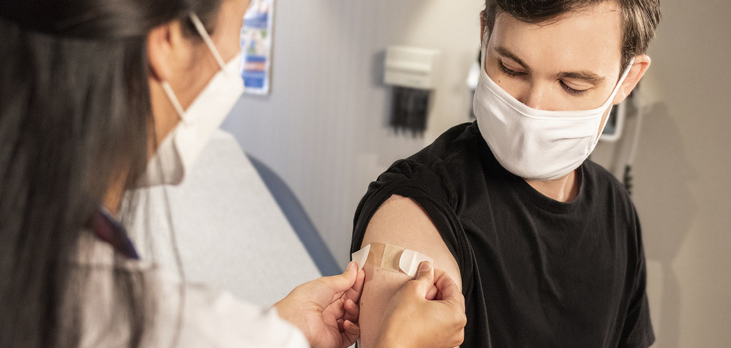 Man getting vaccinated.