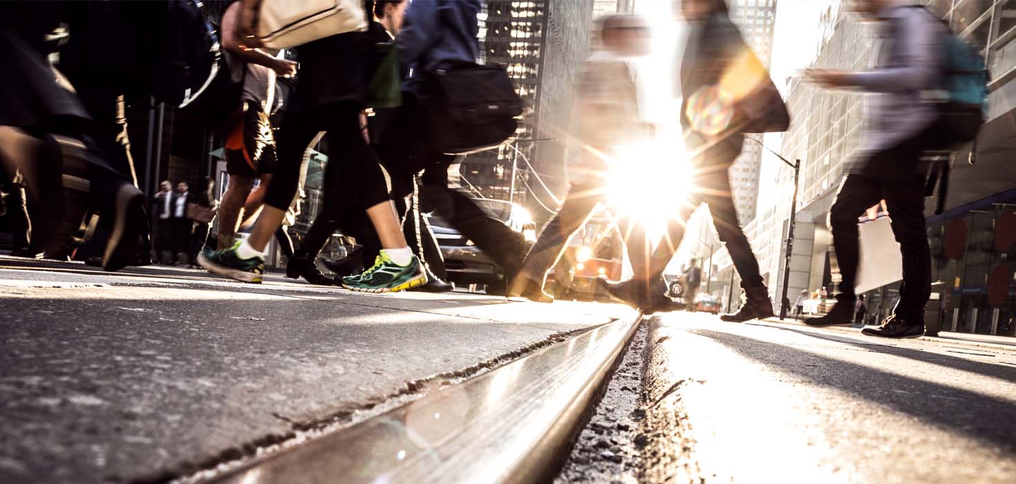 people crossing crowded street